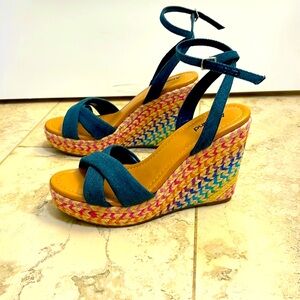 Cute wedge sandals in great condition. You can wear them with anything!